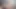 Zoe televizyonda porno izlerken azıyor ve sonunda kanepede kendine dokunuyor