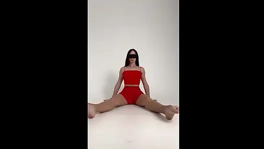 stretching -long legs -red short skirt