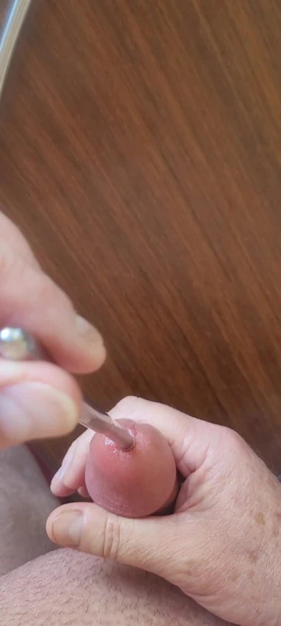 Masturbating my smooth cock with sounding rods before cumming