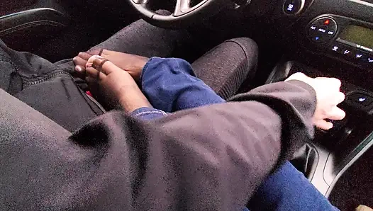 Amateur MILF in jeans and nylon socks gives a taxi driver a footjob