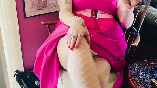 Pink To Make The Boys Wink! Tina Snua In A Leather Dress Smoking A Cigar