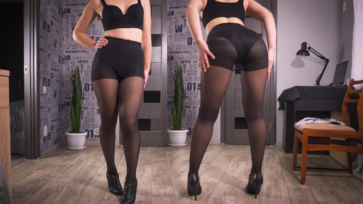 Sıkı külotlu çoraplı sekreter uzun bacakları modelliyor