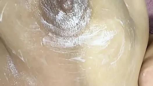 Mom vibrates her big tits with her big vibrator