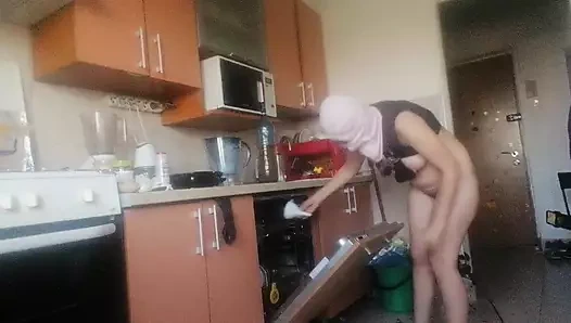 Sexy nude wife preparing food in the kitchen. Hairy brown hair, big ass, big tits