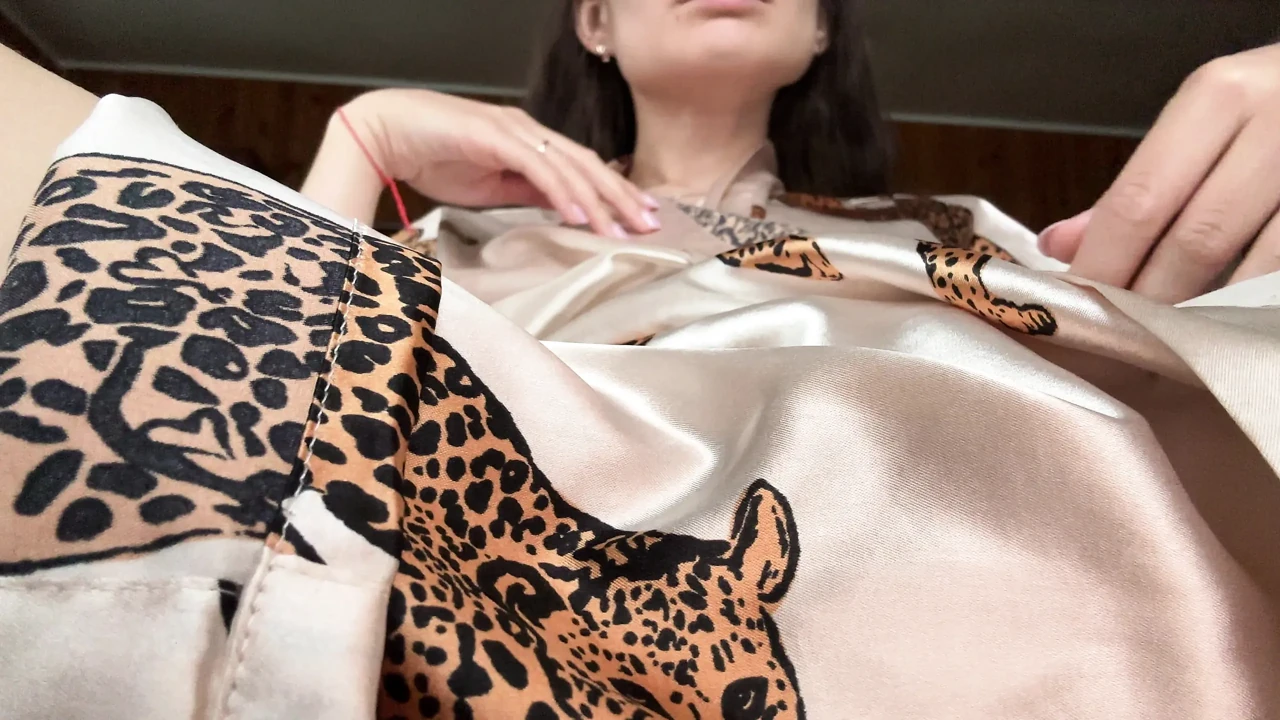 Wearing a short robe, I take off my panties and masturbate my creamy pussy with a vibrator.