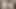 Siyah taytlı dildoyla oynuyor