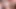 Kırmızılı seksi sarışın kanepede iki büyük yarağı emiyor ve sulu göğüslerine sıvazlıyor