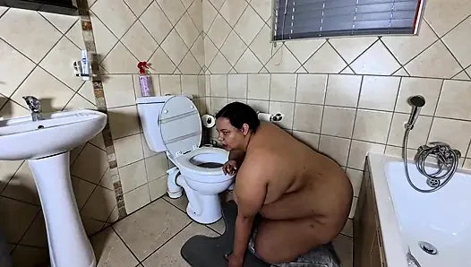 Playing with my fat pussy while licking the toilet