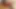 Seksi Asyalı yatak odasında soyunuyor ve oynuyor
