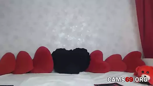 Busty esmer parmaklar ona kedi üzerinde web kamerası