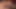 İri göğüslü genç elle dildoyla sikişiyor