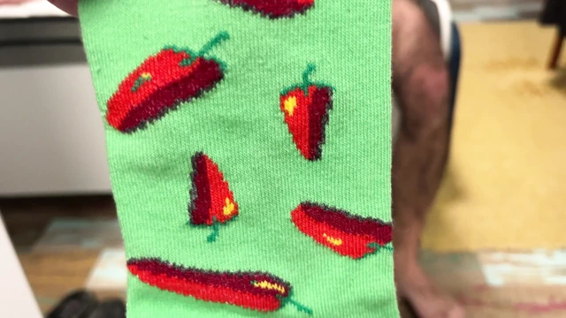 Playful Green Socks with Red Pepper Pattern pres. by Earl Smile