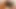 Hotkinkyjo uzun bir dildoyla götünü çok derinden sikiyor. Kum tepelerinde göbek şişkinlik ve sarkma