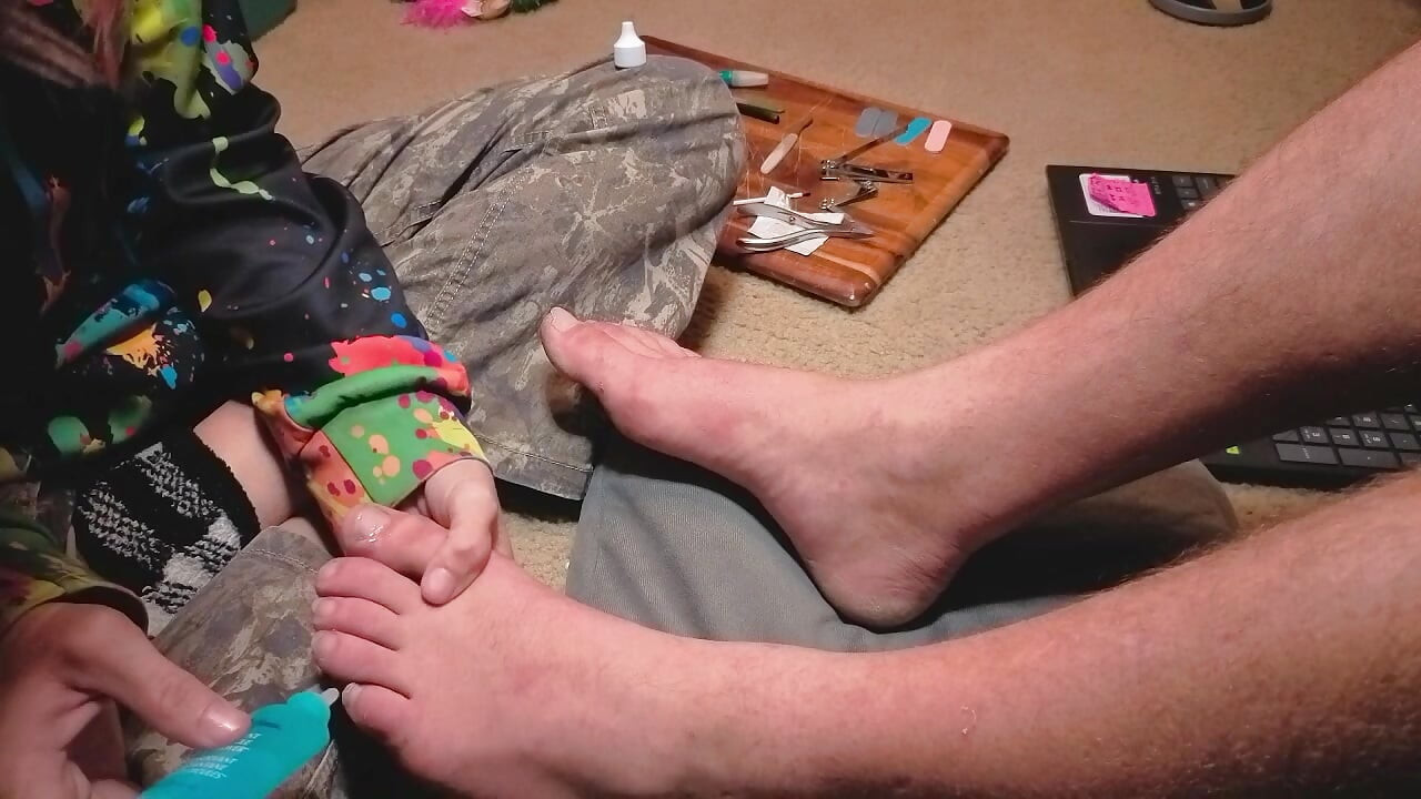 Praising her Masters' feet