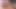 Kırmızı külotlu sıkı kremsi amcığımı büyük siyah dildo yakın çekimle esnetiyorum.