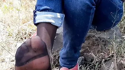 Girl in Jeans and black Nylons