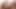 Kızıl saçlı ladyboy okşayarak etek ve korse poz veriyor