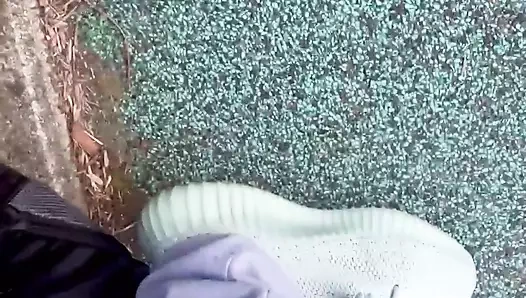 MILF takes a risky public pee while people walk by