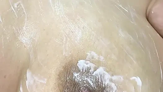 Mom vibrates her big tits with her big vibrator