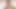 Çarpıcı busty esmer kamera için büyük göğüslerini kapalı gösteriyor