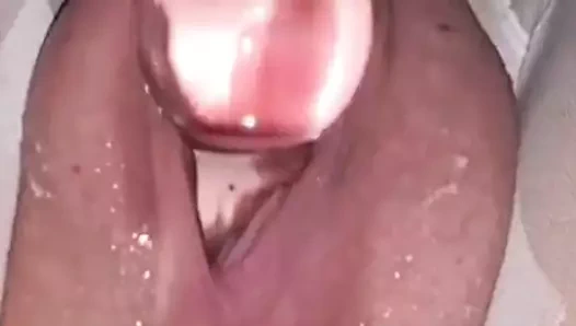 Yakın yukarı oyuncak ile cam yapay penis