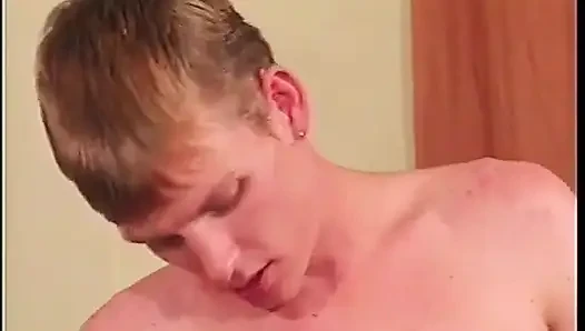 Nasty redhead babe wears a strap-on and fucks two gays