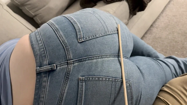 Caned in Jeans