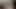 Orta yaşlı seksi kadın yatakta mumlarla esaret fetişinin tadını çıkarıyor