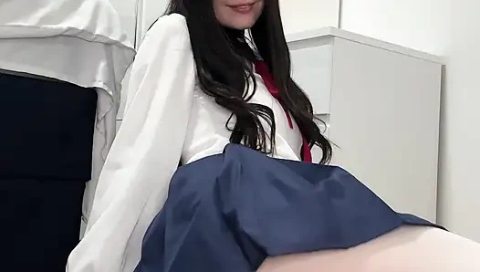 Sexy Black Haired Teen in Japanese School Uniform Undresses on Floor