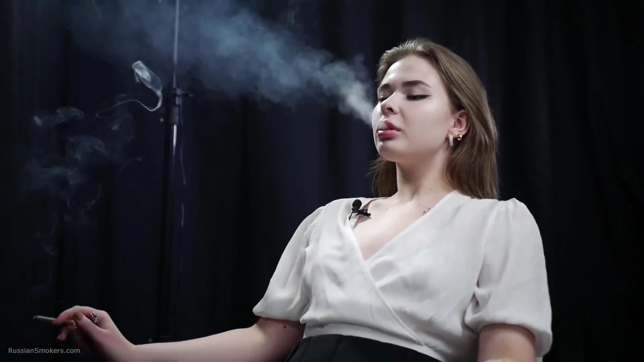 Russian Blonde Babe Smoking in White Blouse