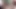 Sevimli femboy mastürbasyon yaparken kamera için ayaklarını gösterir