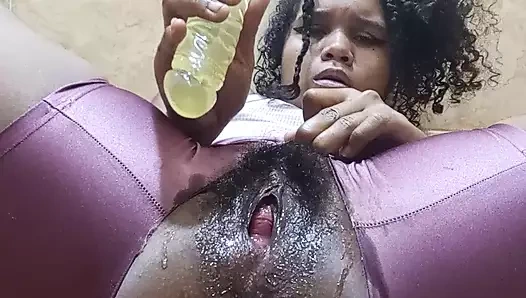 Horny brunette gets a dildo in her wet and hairy pussy until she makes a big squirt all over the floor