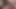 Bir bornoz içinde koyu saçlı ladyboy küçük horoz emdi alır