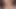 Bal tenli orta yaşlı seksi kadın kanepede büyük bir siyah yarağın tadına bakıyor