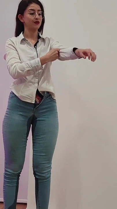 PISSING IN TIGHT BLUE JEANS SOAKED PANTIES WETTING PANTS | Clip 1
