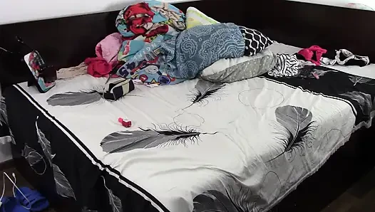 Sexy brunette doing naked chores around the house.