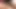 Dik memeli üç seksi esmer kanepede oyuncaklarla mastürbasyon yapıyor
