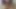 Ateşli kadın büyük zenci videosu izliyor ve kendine dokunuyor.