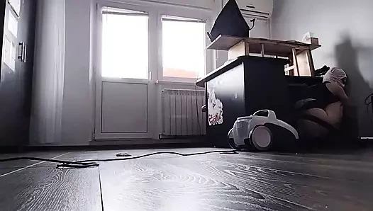 Amateur wife vacuuming naked in the house.