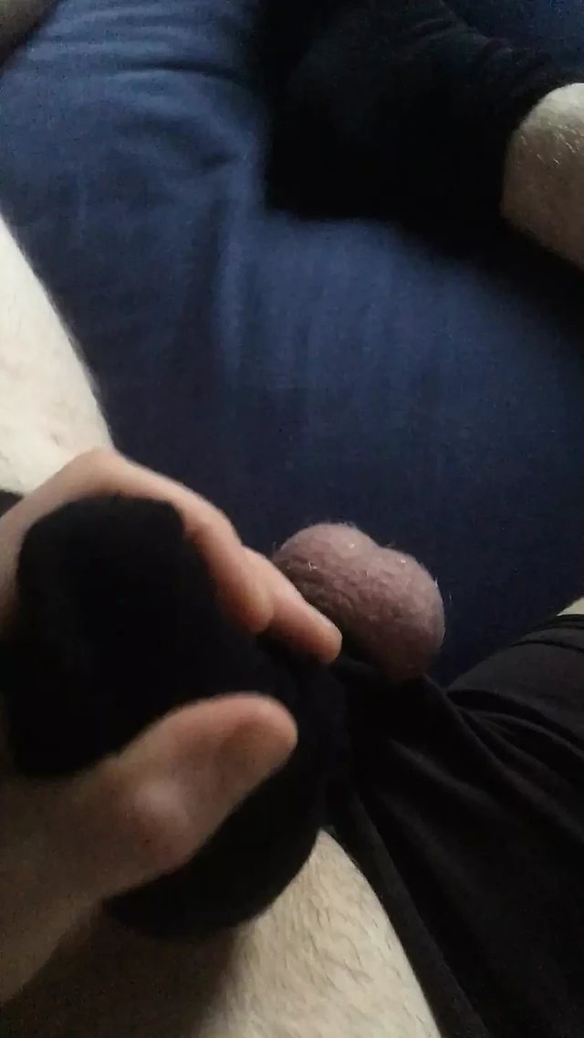 Бондаж яиц и член с насадкой и носки в презервативе