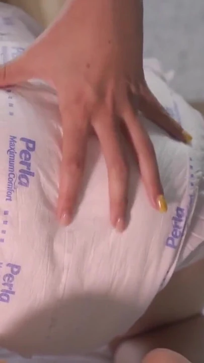 Spectacular moment from "Baby tears up an adult diaper!"