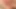 Sarışın pembe çizmeli büyük mor dildoya biniyor