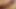 Yüksek topuklu dövmeli ladyboy kanepede mastürbasyon yapıyor
