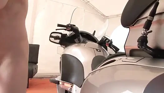 Horny brunette gets fucked on motorcycle