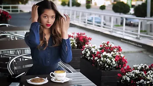 Magnetic Russian Beauty Playing with Cigarette Smoke