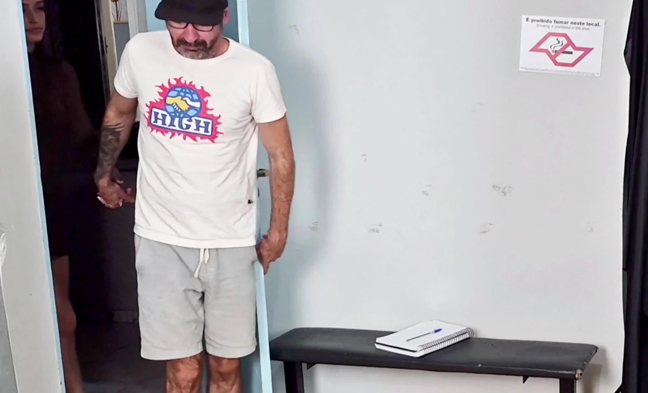 Wife Gets a Shot in the Butt Right Behind Her Oblivious Cuckold Husband!