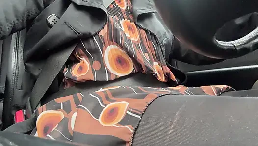 Elegant stepmom drives to the office wearing tights and a beautiful dress