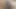 Büyük örgülü küçük bir bebek siyah dildoyla oynuyor