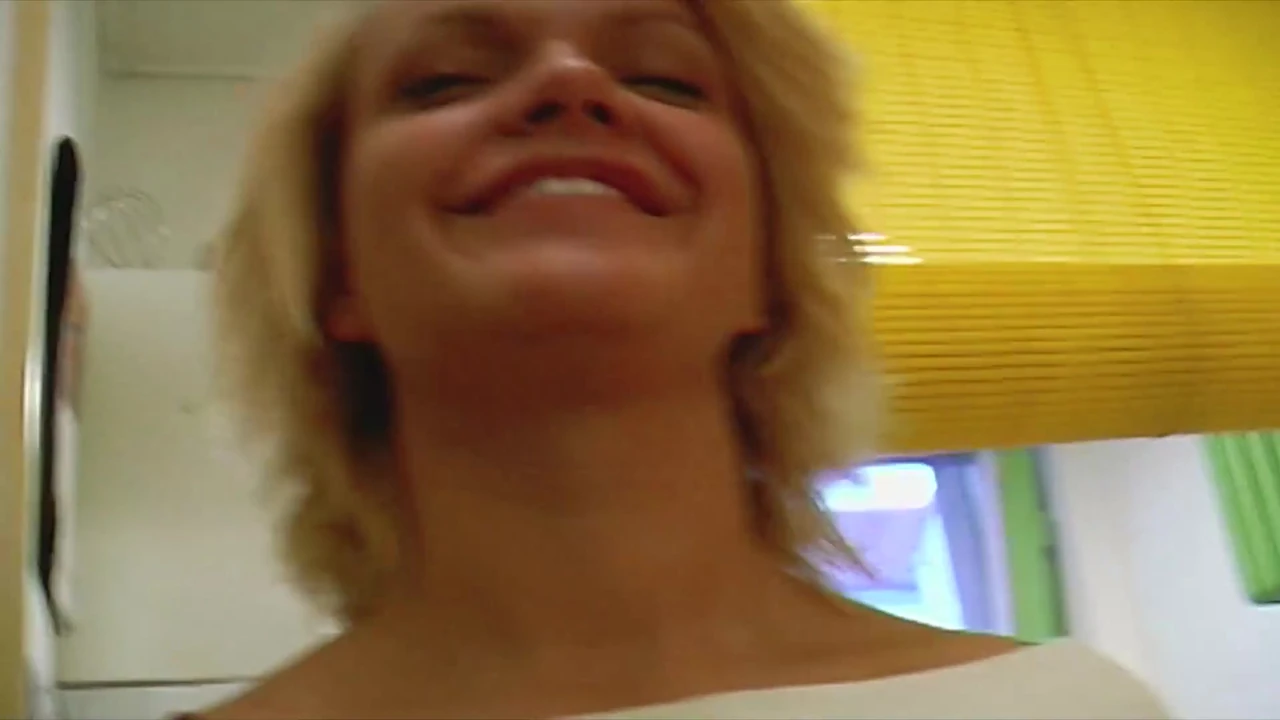 Beautiful German blonde gets fucked by two hard peckers