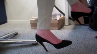 danglind jimmy choo under desk 1